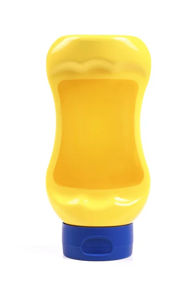 Žlutá prázdné produktu láhev — Stock fotografie