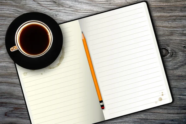 Notebook en koffie beker — Stockfoto