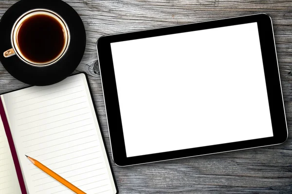 Arbeitsplatz mit digitalem Tablet, Notebook und Kaffeetasse lizenzfreie Stockbilder