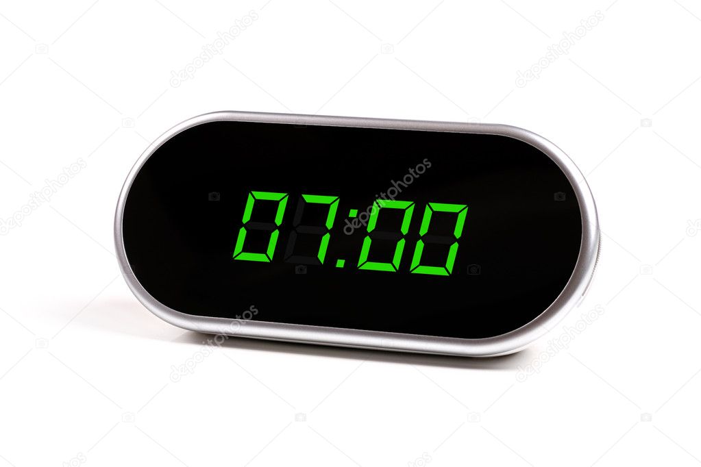 Digital alarm clock with green digits
