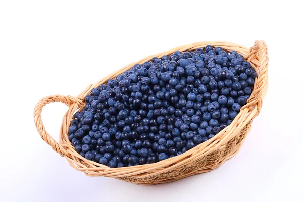 Wicker basket with blueberries — Stock Photo, Image