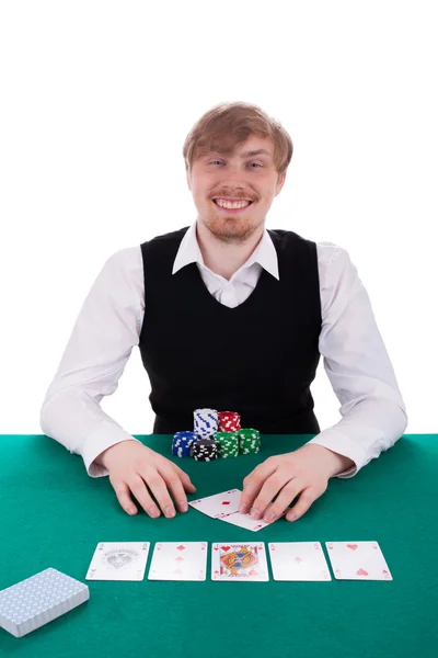 En ung mann spiller poker. – stockfoto