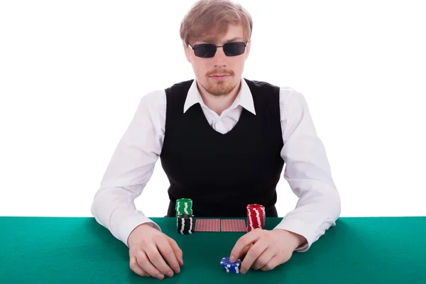 A young man is playing poker — Stock Photo, Image