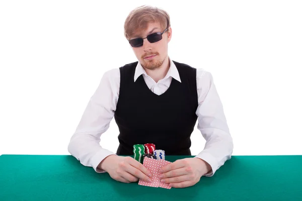A young man is playing poker — Stock Photo, Image