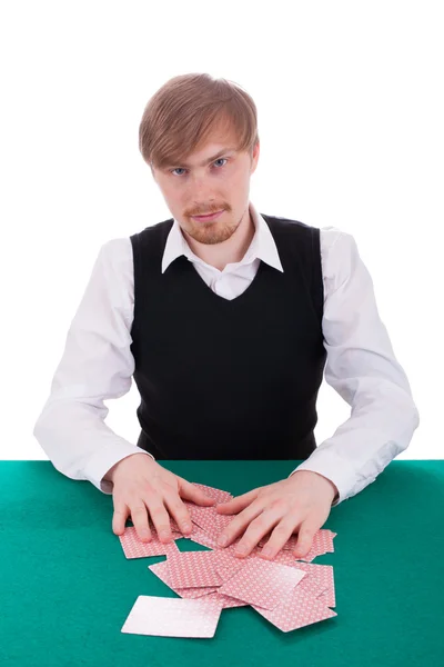 Genç bir adam poker oynuyor — Stok fotoğraf