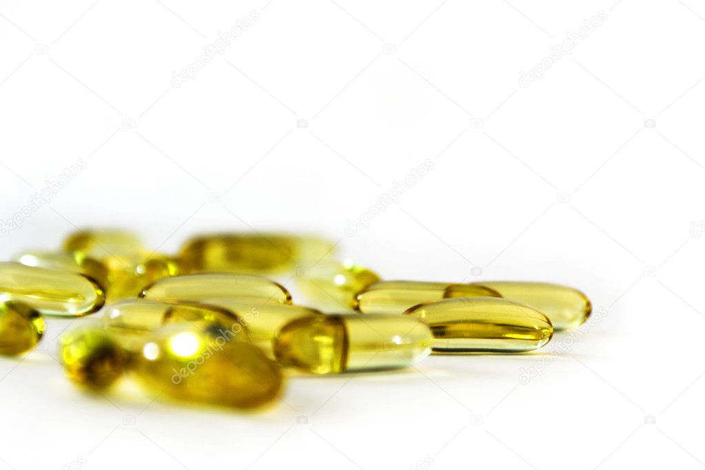 Yellow Fish Oils Isolated on White Background