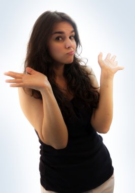 Young Girl Shrugging with I do not know gesture, isolated on whi clipart