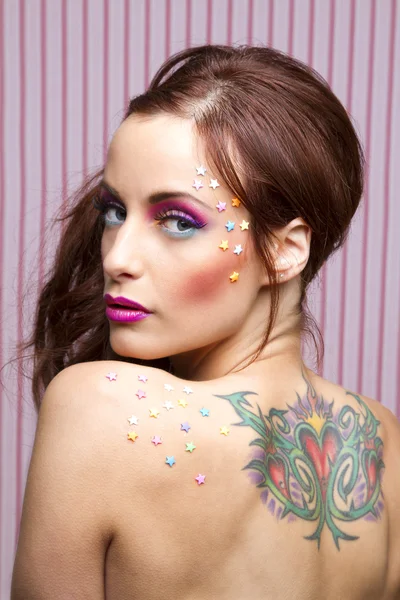Candy and tattoo — Stock Photo, Image