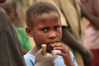 DR CONGO - NOV 2ND : Refugees cross from DR Congo into Uganda at clipart