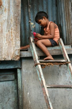 Child in Slums in Bombaby , Mumbai, India clipart