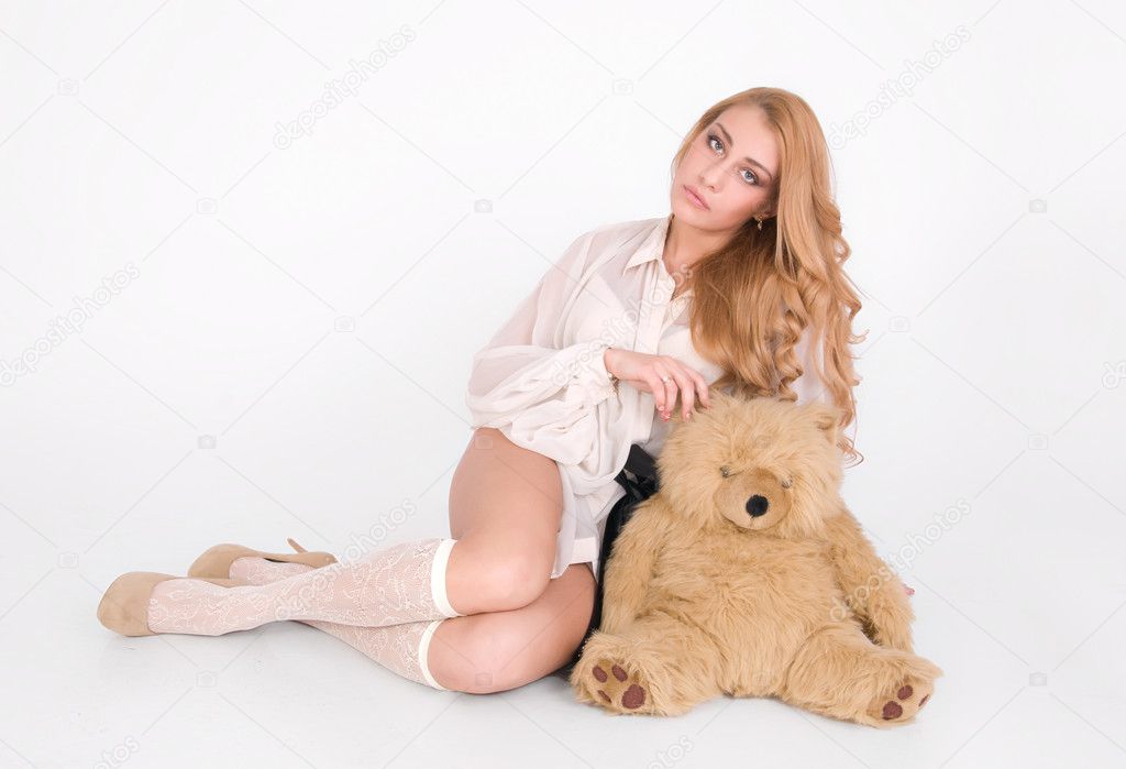 Lonely cute girl sit with lovely teddy bear
