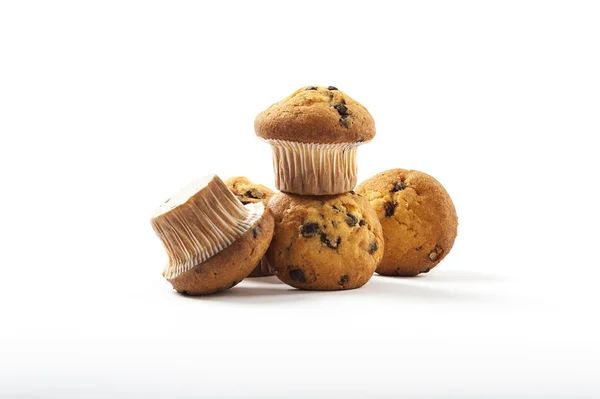 Deliciosos muffins em um fundo branco — Fotografia de Stock