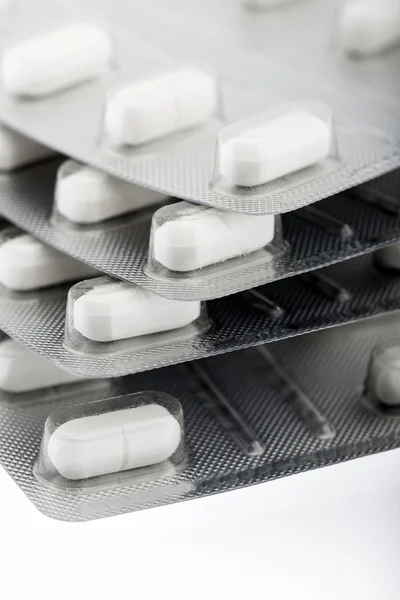Blister stack packs of white pills — Stock Photo, Image