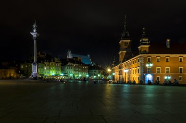 Old Town in Warsaw during the nighht clipart