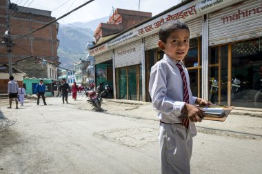 Nepalese pupil on Kathmandu street clipart