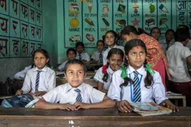 Group of Nepalese pupils in a class clipart