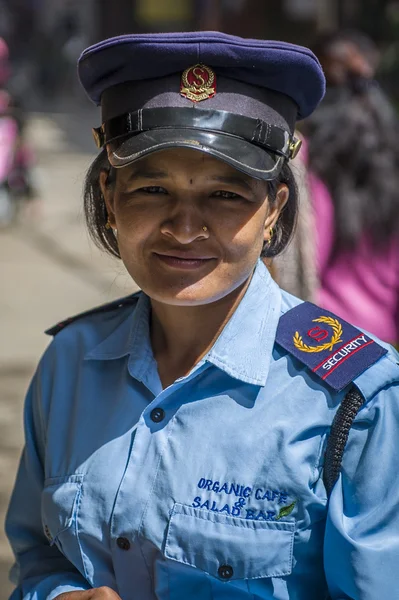 Security woman on Kathmandu street — Stock Photo, Image