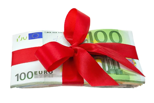 Un mazzo di banconote in euro come regalo con fiocco — Foto Stock