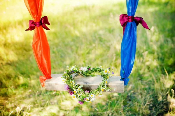 Wreath of flowers in the shape of a heart — Stock Photo, Image