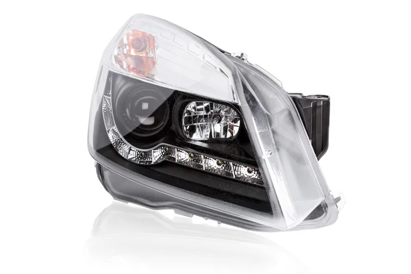 New car headlights on a white background — Stock Photo, Image
