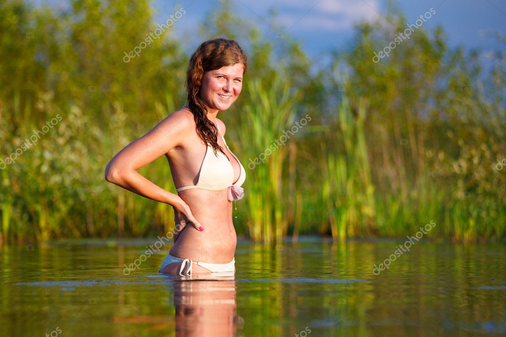Girl bathing in a lake Stock Photo by ©jenoche 12012003