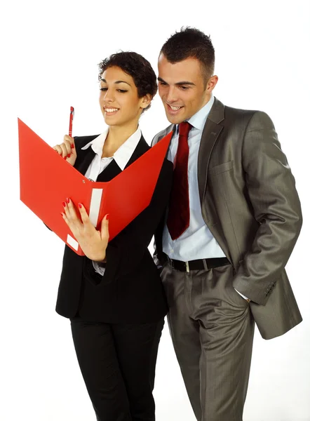 Business man en vrouw op zoek naar bestanden — Stockfoto