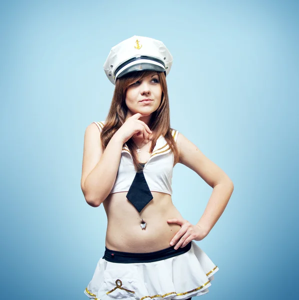 Promyšlené sexy dívka v sailor barvy Royalty Free Stock Fotografie