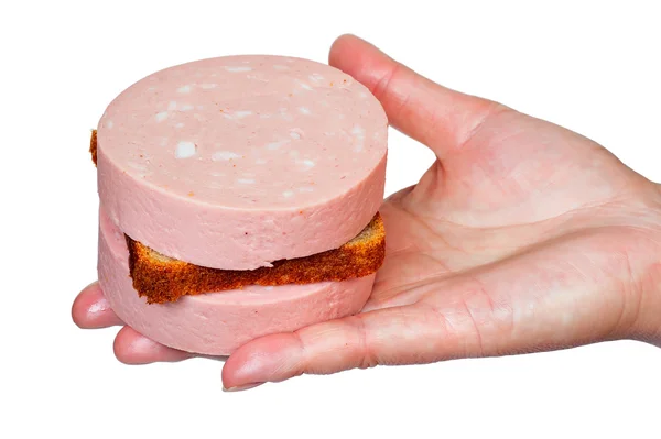 Sandwich met gekookte worst liggend op een palm — Stockfoto