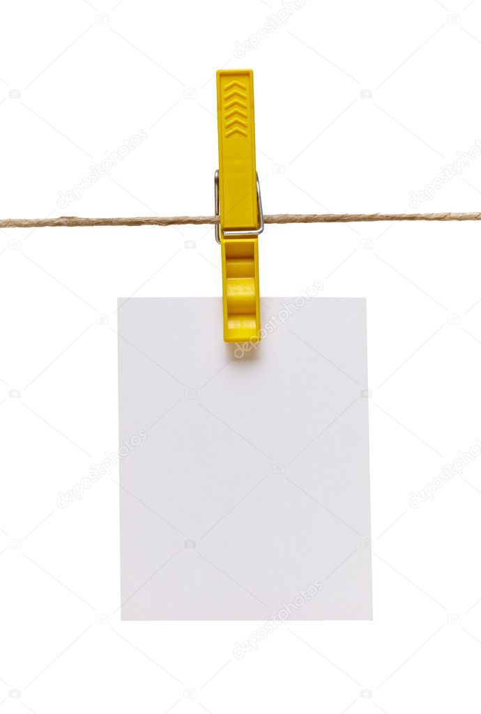 Clothes peg and note paper on clothes line rope