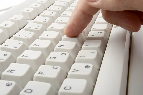 Keyboard and hand — Stock Photo, Image