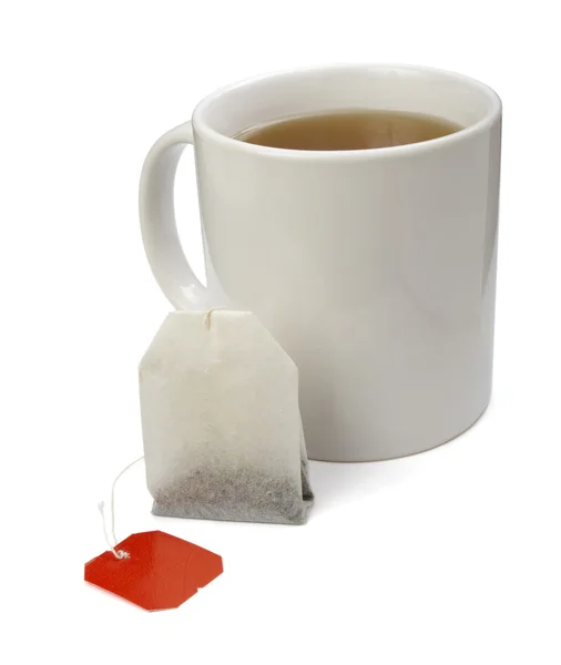 Saco de chá e xícara — Fotografia de Stock