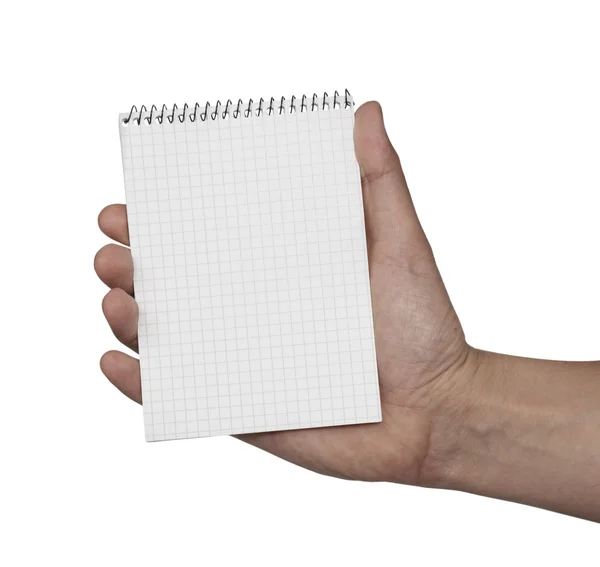 Caderno em branco papel e mão — Fotografia de Stock