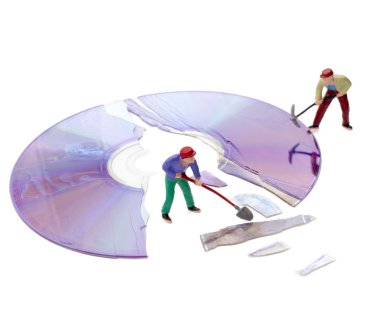 minyatür toy işçi bilgisayar kırık kompakt disk tamiri