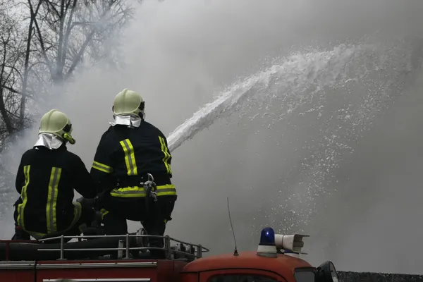 Strażak awaryjne niebezpieczeństwo ogień strażak — Zdjęcie stockowe
