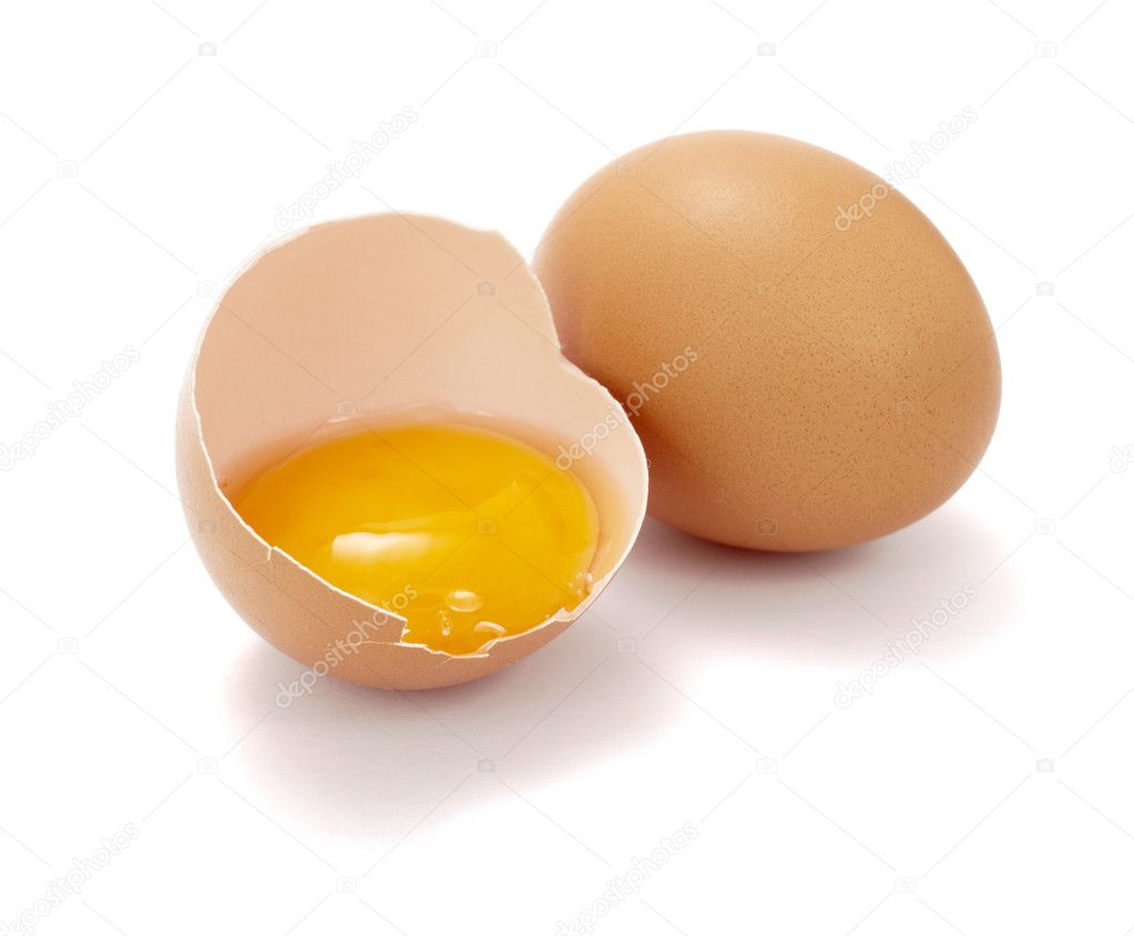 Close up of halved broken egg on white background, with clipping path