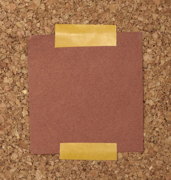 Papel velho marrom nota fundo placa de cortiça — Fotografia de Stock