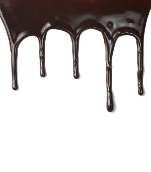 Suklaa siirappi vuotaa nestettä makeaa ruokaa — kuvapankkivalokuva