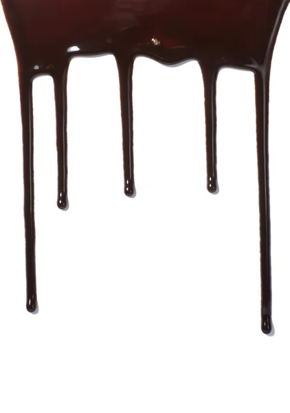 Chocolate syrup leaking liquid sweet food — Stock Photo, Image
