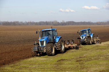 Agriculture tractor cultivated lanf field vegetable clipart