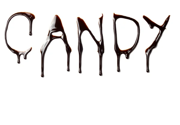 Çikolata şurubu sıvı yiyecek harfleri sızıntı — Stok fotoğraf
