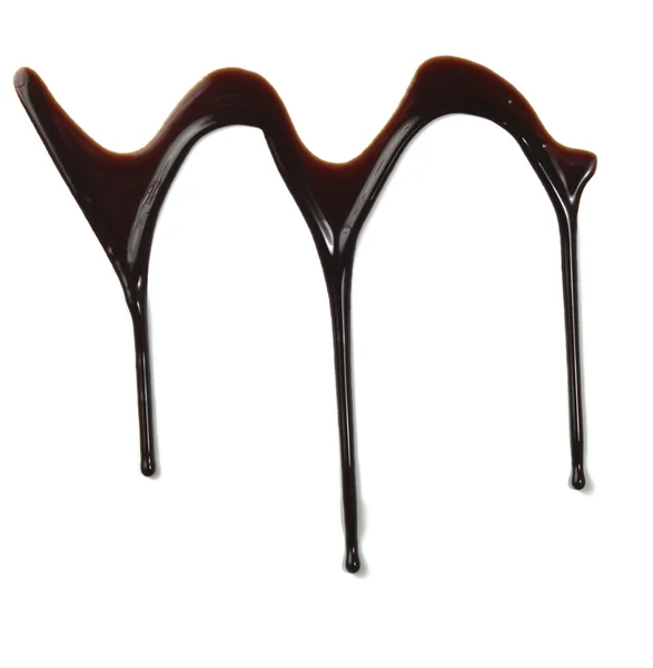 Jarabe de chocolate que gotea alimento dulce líquido — Foto de Stock