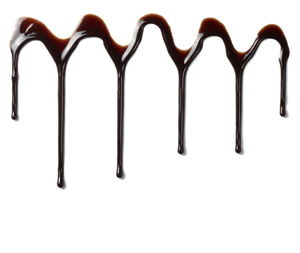 Jarabe de chocolate que gotea alimento dulce líquido —  Fotos de Stock
