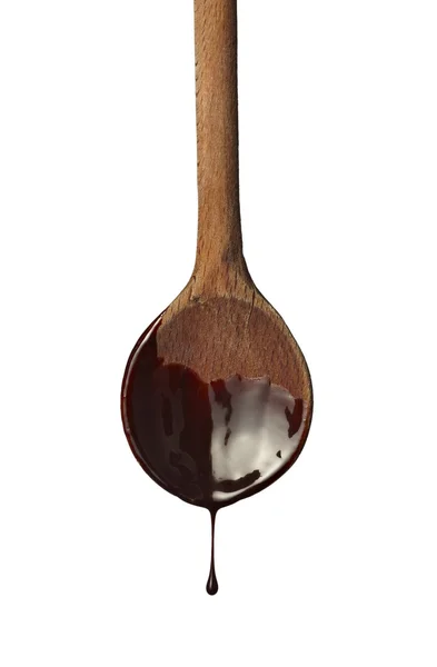 Lepel preperation keuken gereedschap eten chocolade siroop lekken — Stockfoto
