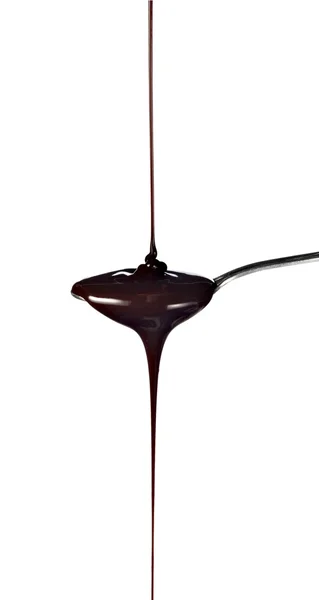 Передпосівна ложка кухонний інструмент їжа шоколадний сироп витікає — стокове фото