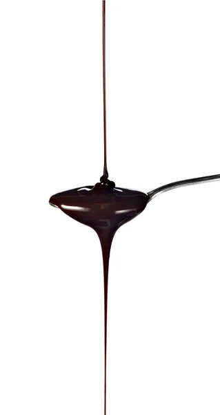 stock image Spoon preperation kitchen tool food chocolate syrup leaking