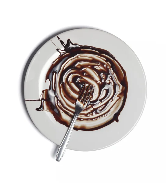 Čokoládový sirup uniká omáčka jíst sladké jídlo — Stock fotografie
