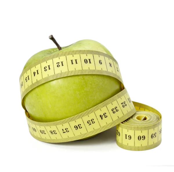 Measure tape tailor diet fitness apple fruit food length weight — Stock Photo, Image