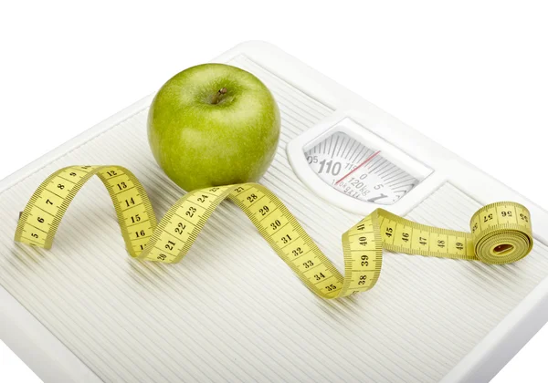 Escala libra medida cinta dieta fruta comida manzana — Foto de Stock