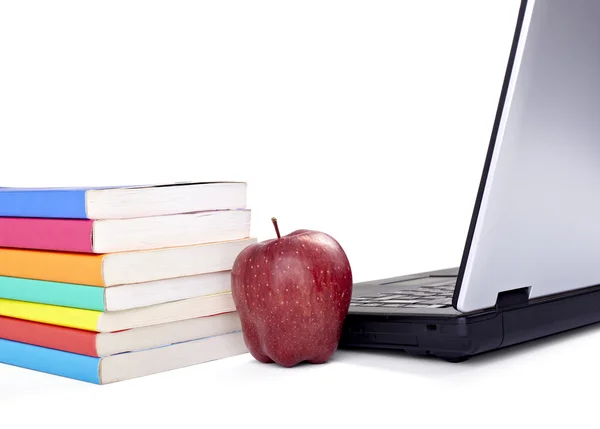 Computadora portátil libros manzana fruta comida educación escuela — Foto de Stock