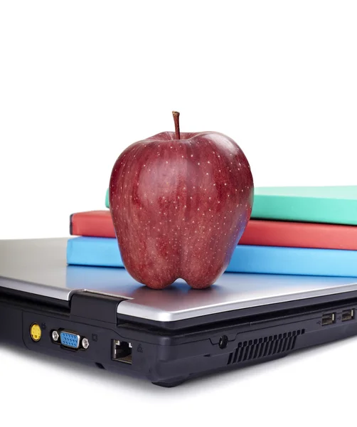 Laptop computer books apple fruit food education school — Stock Photo, Image